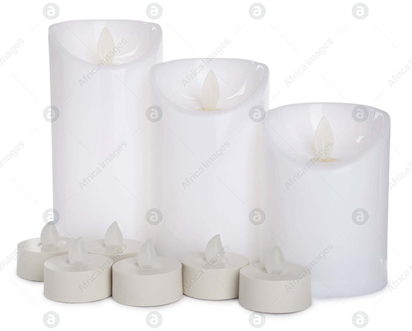 Photo of Different decorative flameless LED candles on white background