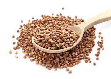 Photo of Raw buckwheat grains on white background. Healthy cereals