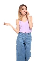 Photo of Young woman talking on phone against white background