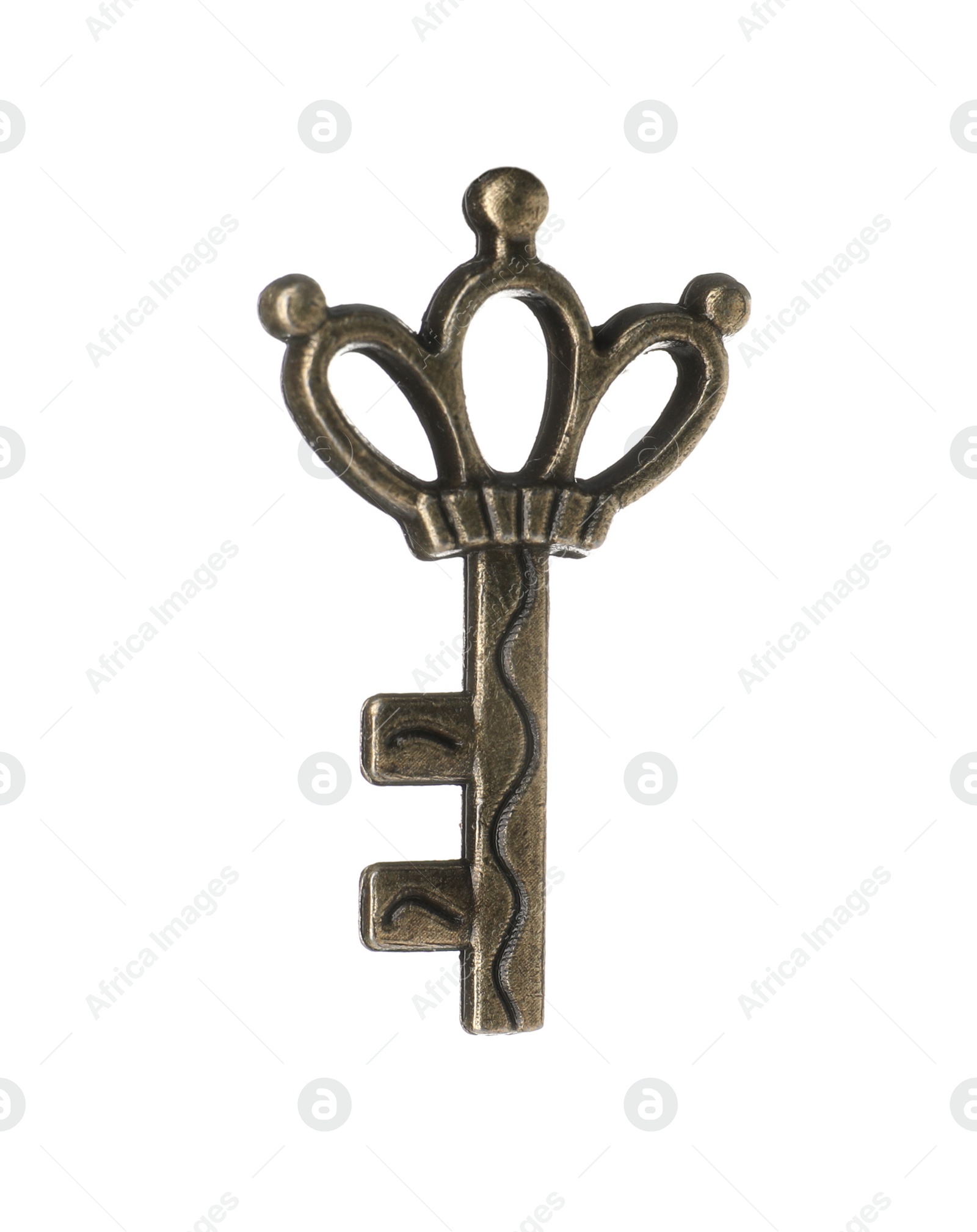 Photo of Bronze vintage ornate key on white background