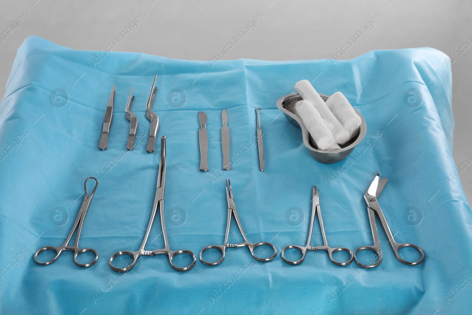 Photo of Set of different surgical instruments on table