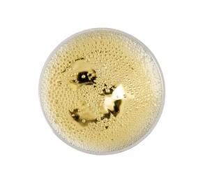 Glass of champagne on white background, top view. Festive drink