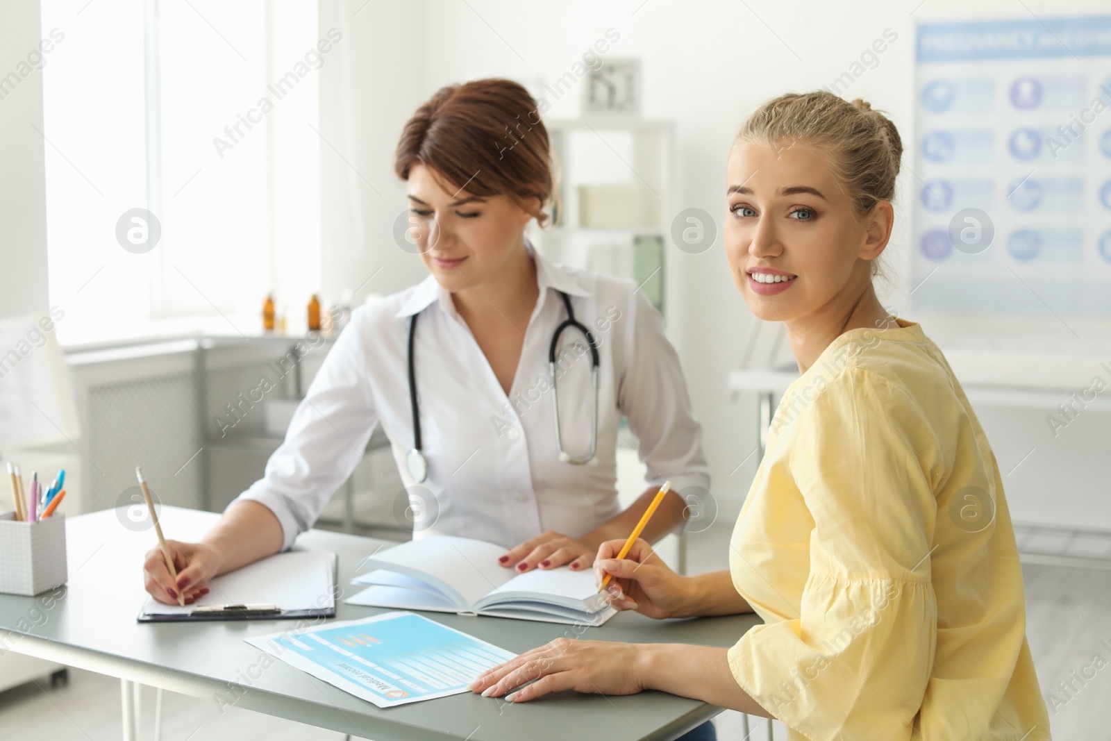 Photo of Patient having appointment with doctor in hospital