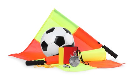 Photo of Football referee equipment. Soccer ball, flags, stopwatch, cards and whistle isolated on white