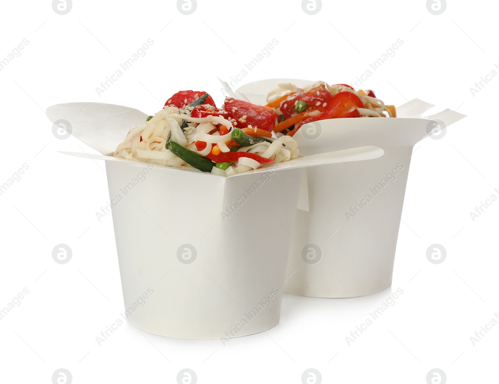 Photo of Boxes of vegetarian wok noodles isolated on white