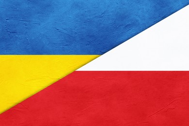 Image of Flags of Ukraine and Poland on textured background. International diplomatic relationships