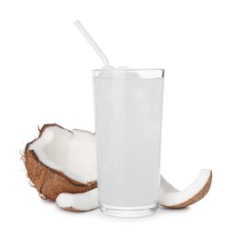 Photo of Glass of coconut water, ice cubes and nut isolated on white