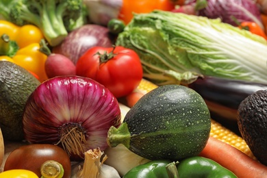 Photo of Many different fresh vegetables as background, closeup