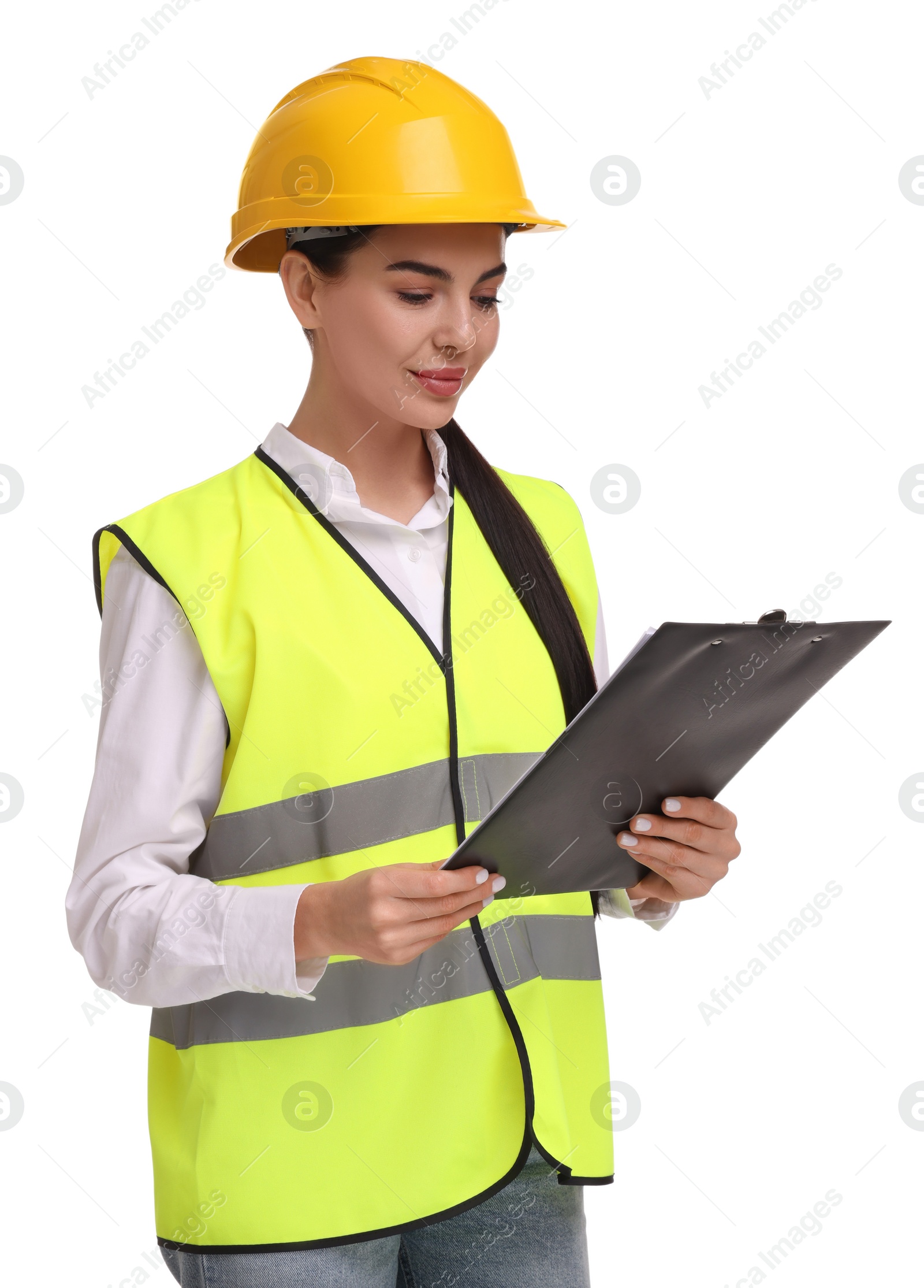 Photo of Engineer in hard hat holding clipboard on white background