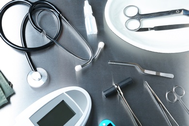 Set of medical objects on grey background, above view