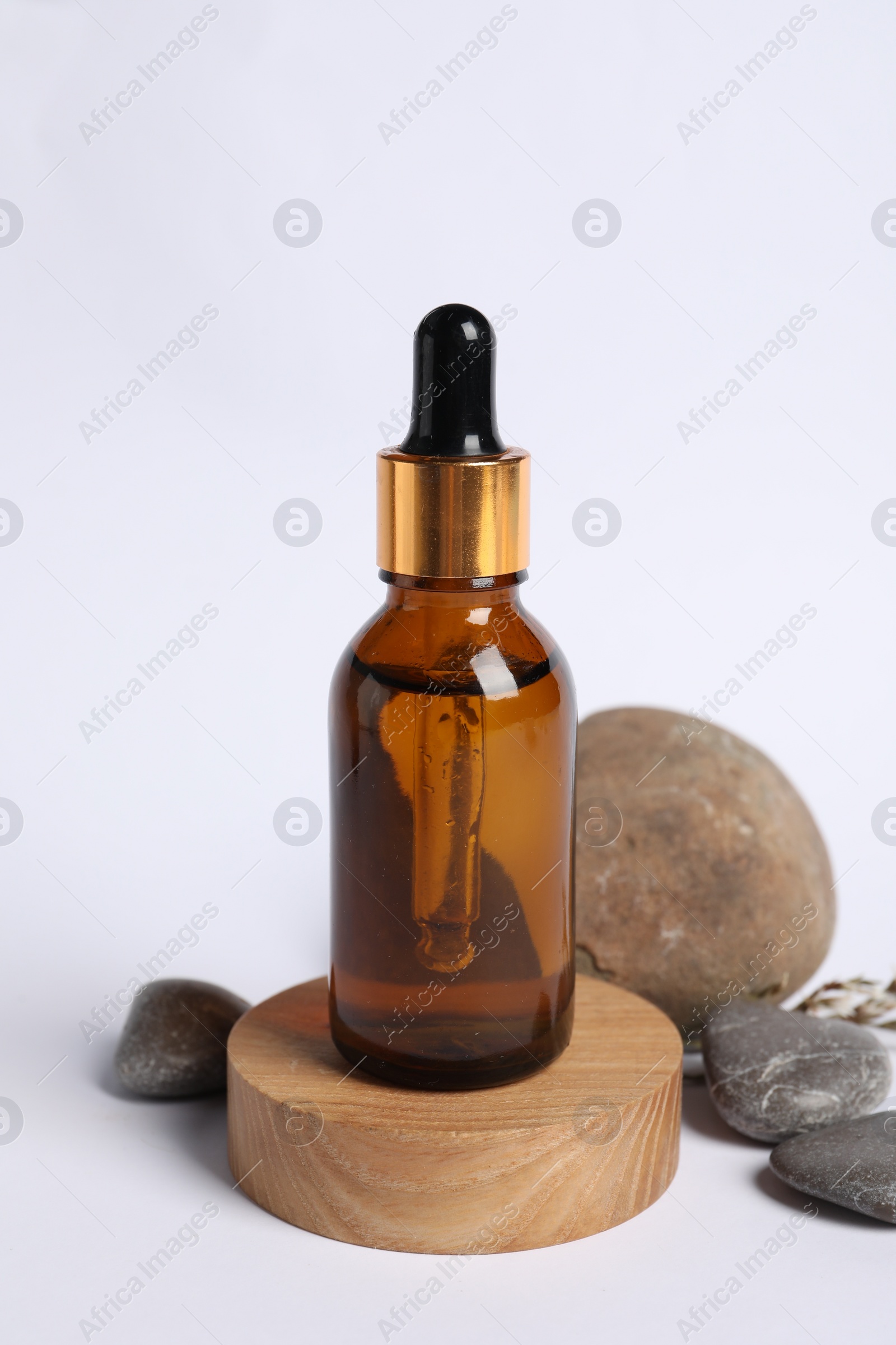 Photo of Composition with bottle of cosmetic serum on white background