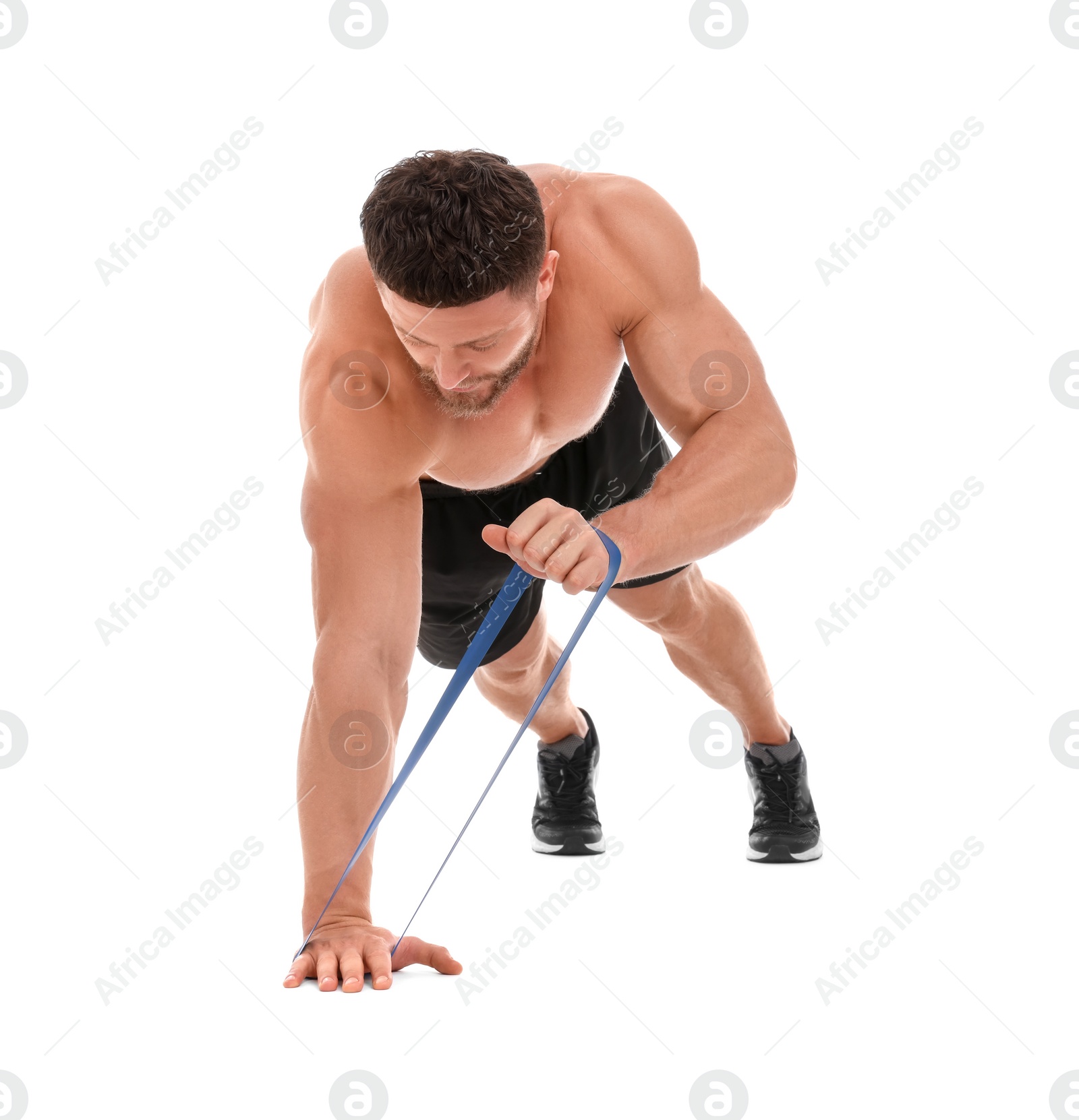 Photo of Young man exercising with elastic resistance band on white background