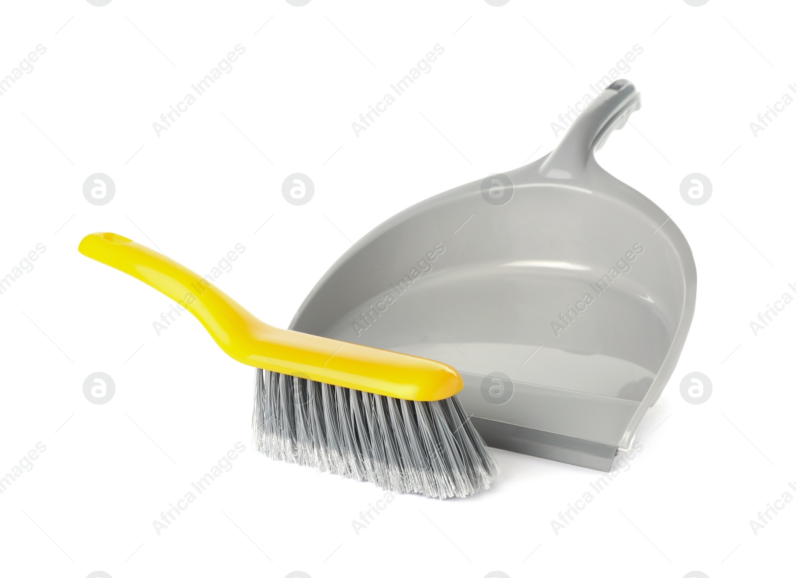Photo of Plastic hand broom and dustpan on white background
