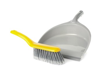Photo of Plastic hand broom and dustpan on white background