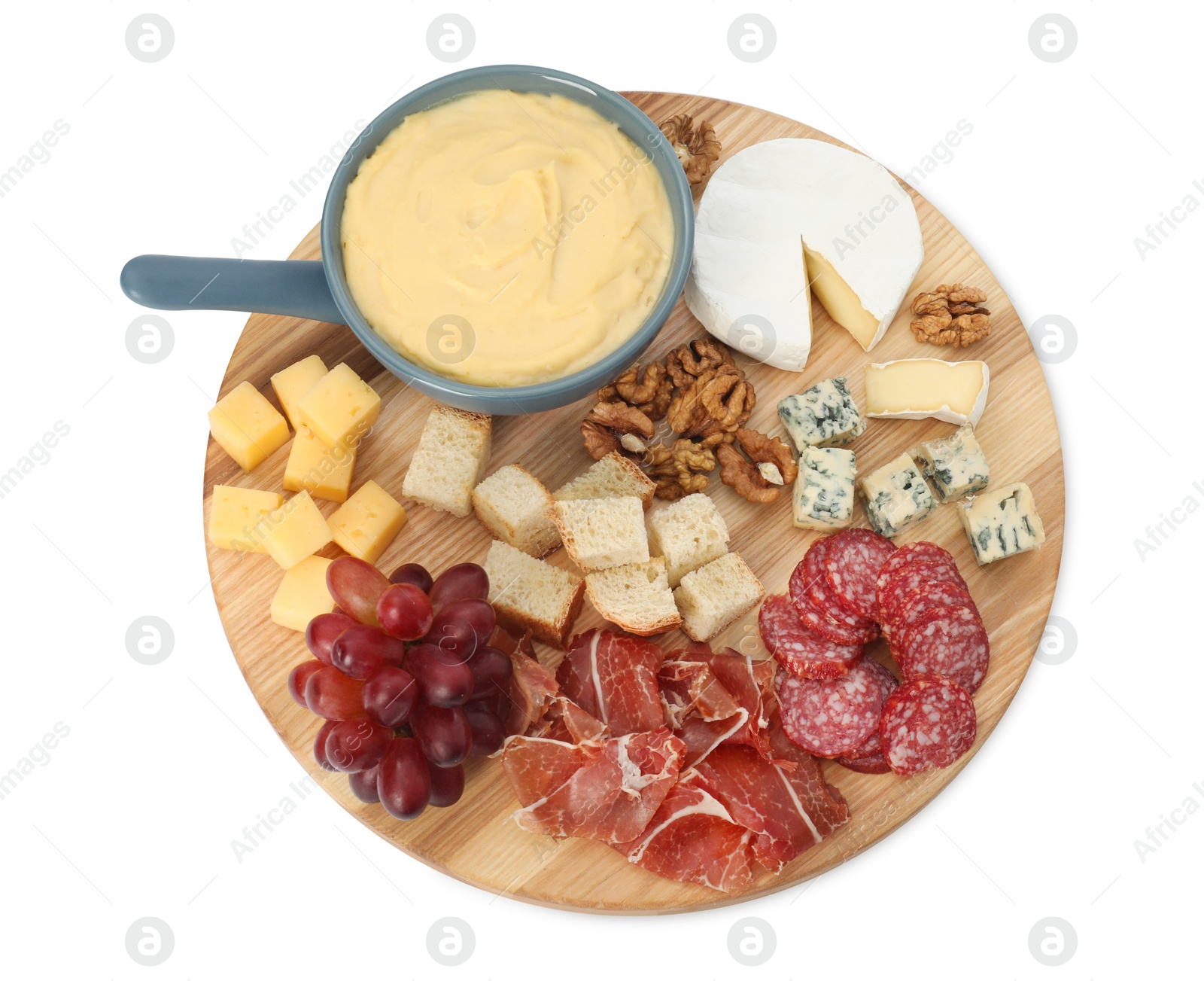 Photo of Fondue with tasty melted cheese and different snacks isolated on white, top view