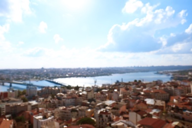 Photo of Blurred view of beautiful city near sea