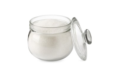 Photo of Glass jar of granulated sugar isolated on white
