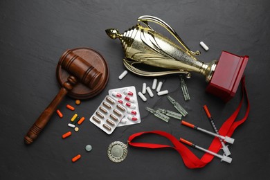 Photo of Flat lay composition with drugs on black background. Doping control