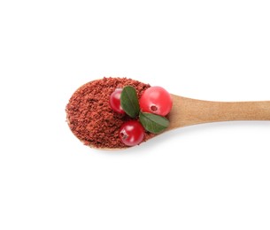 Photo of Wooden spoon with dried cranberry powder, fresh berries and green leaves isolated on white, top view