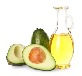 Photo of Cooking oil and fresh avocados isolated on white