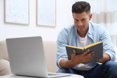 Photo of Teacher giving online lesson during quarantine. Studying at home