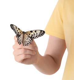 Photo of Woman holding beautiful rice paper butterfly on white background, closeup