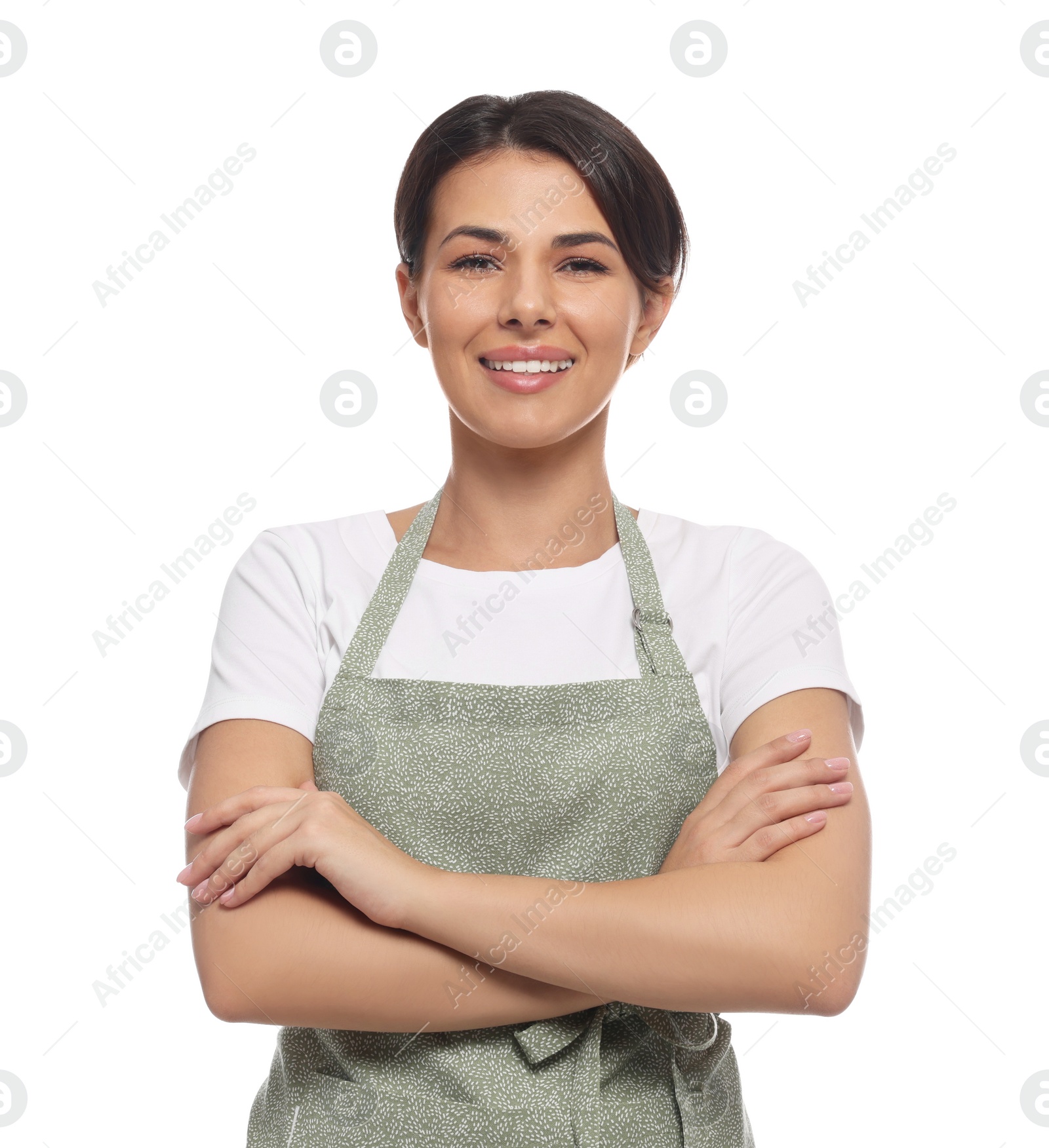 Photo of Young woman in green apron on white background