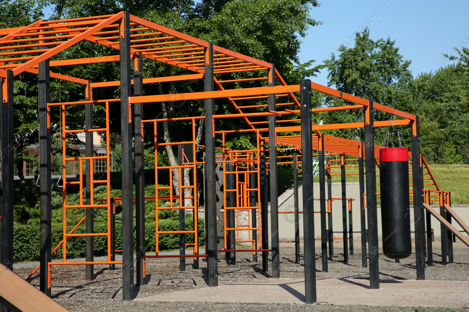 Photo of Empty outdoor gym with exercise equipment in park