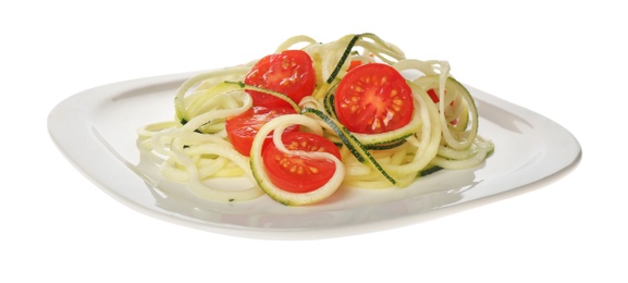 Photo of Delicious fresh zucchini pasta with cherry tomatoes on white background
