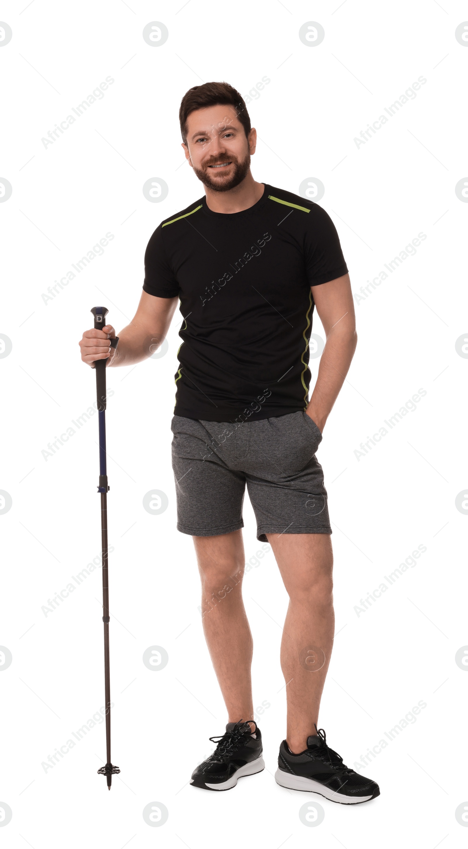 Photo of Man with pole for Nordic walking isolated on white