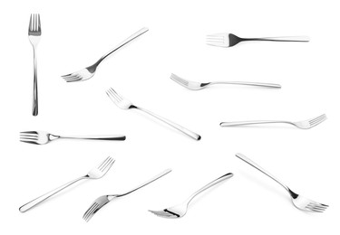 Image of Shiny silver forks isolated on white, set