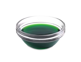 Photo of Glass bowl with green food coloring isolated on white