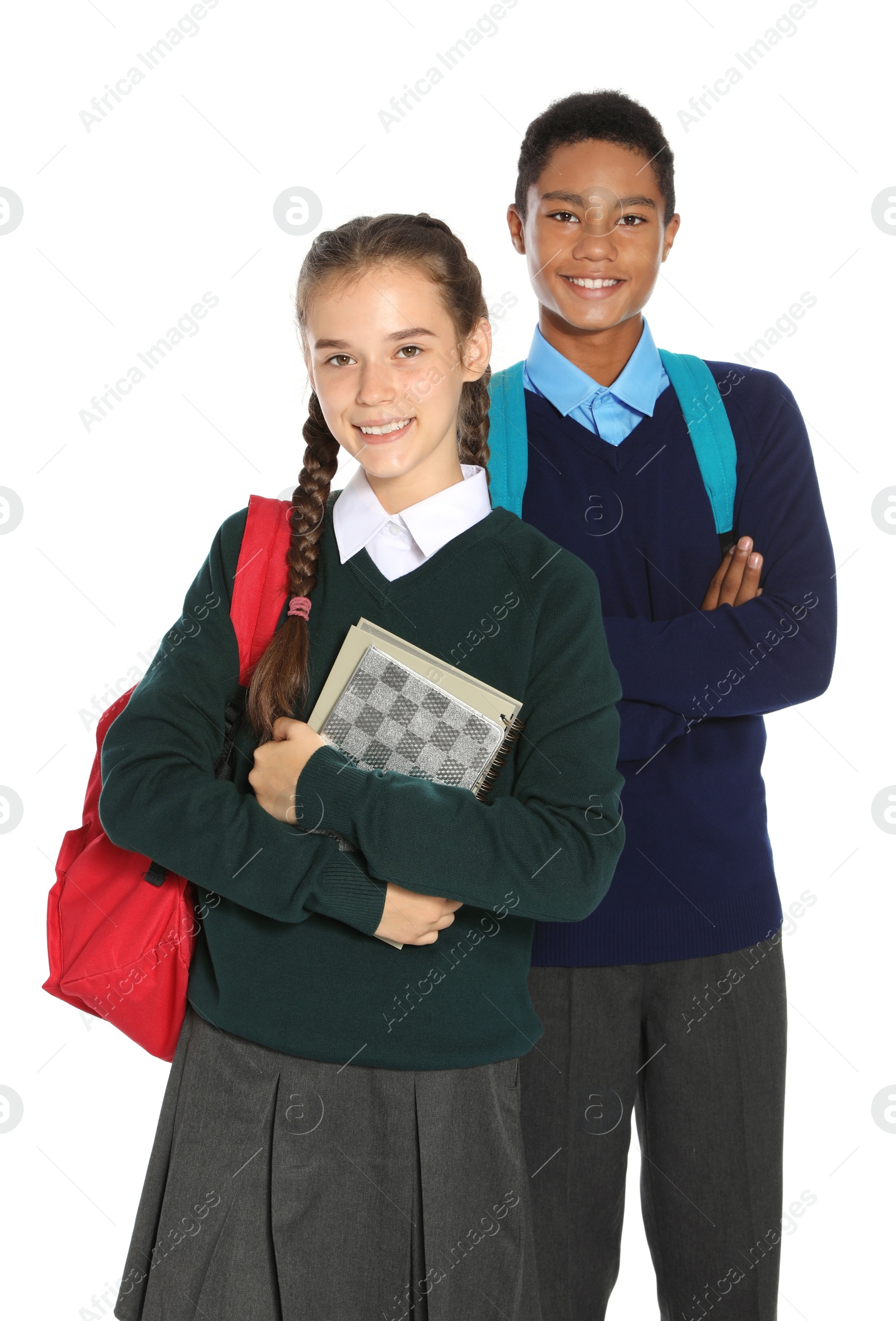 Photo of Teenagers in stylish school uniform on white background