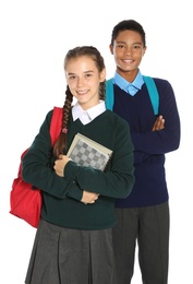 Teenagers in stylish school uniform on white background