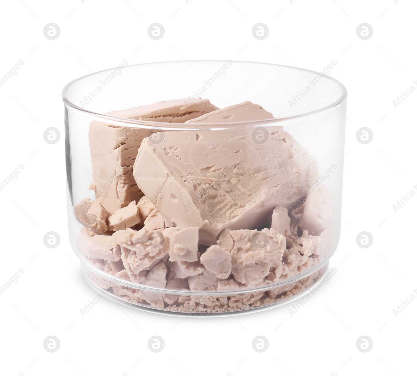 Photo of Pieces of compressed yeast in glass jar isolated on white