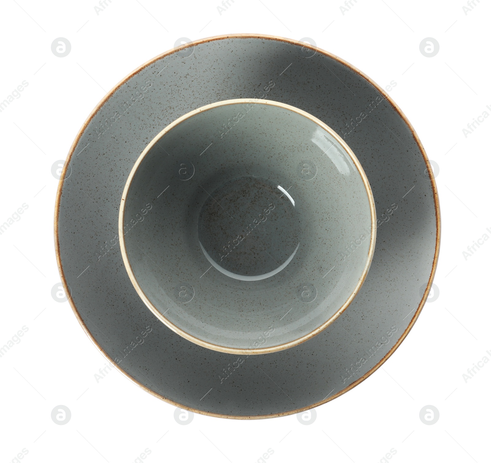 Photo of New grey ceramic plate and bowl on white background, top view
