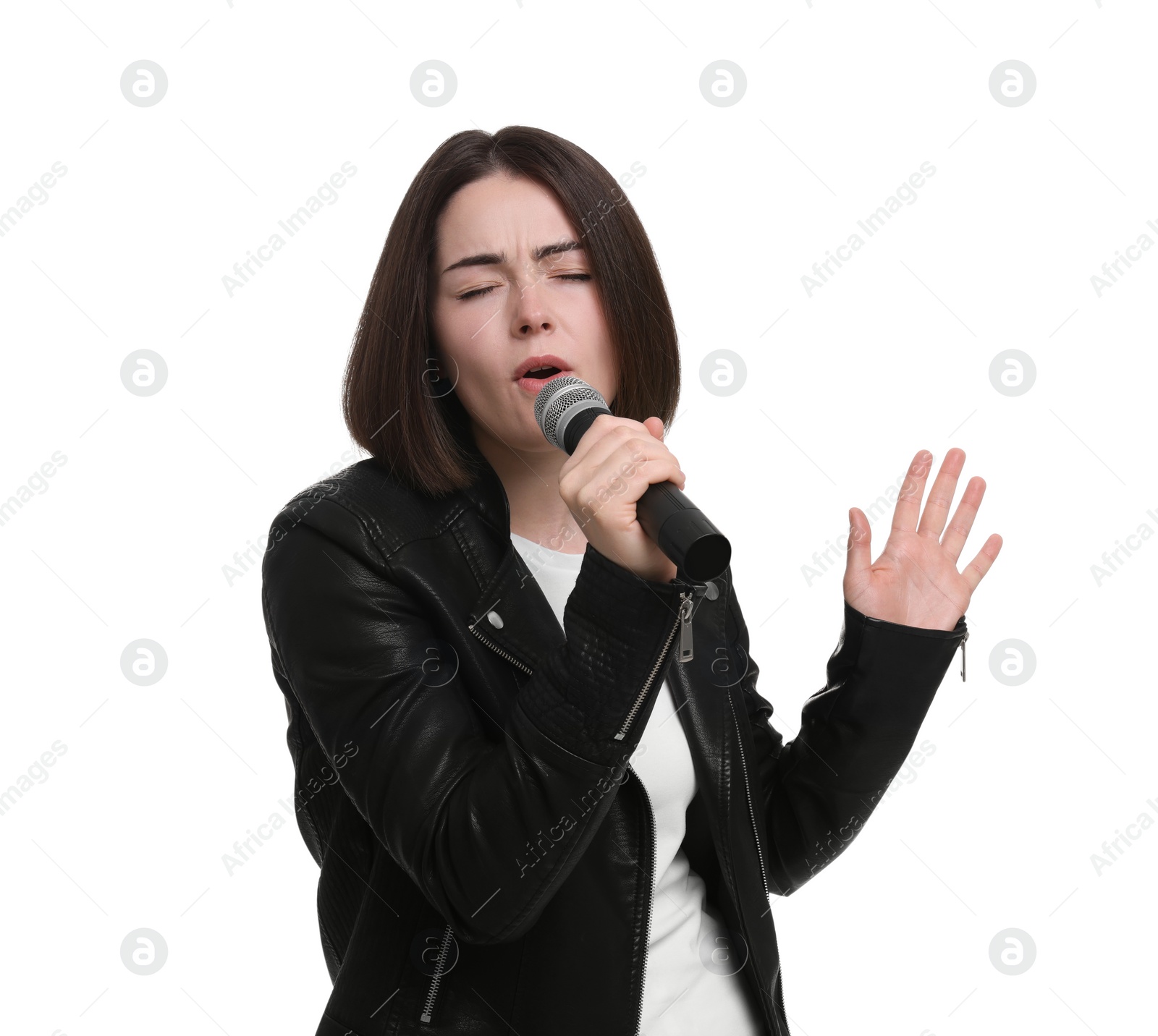 Photo of Beautiful young woman with microphone singing on white background