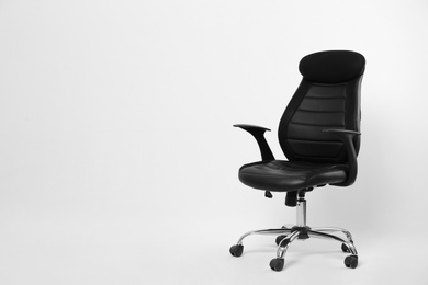 Photo of Comfortable office chair on white background, space for text