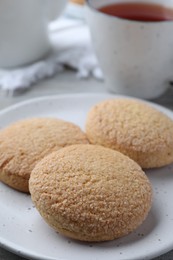 Photo of Delicious sugar cookies on plate, closeup view