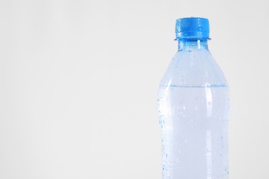 Plastic bottle with pure water isolated on white