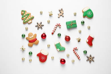 Flat lay composition with Christmas decorations on white background