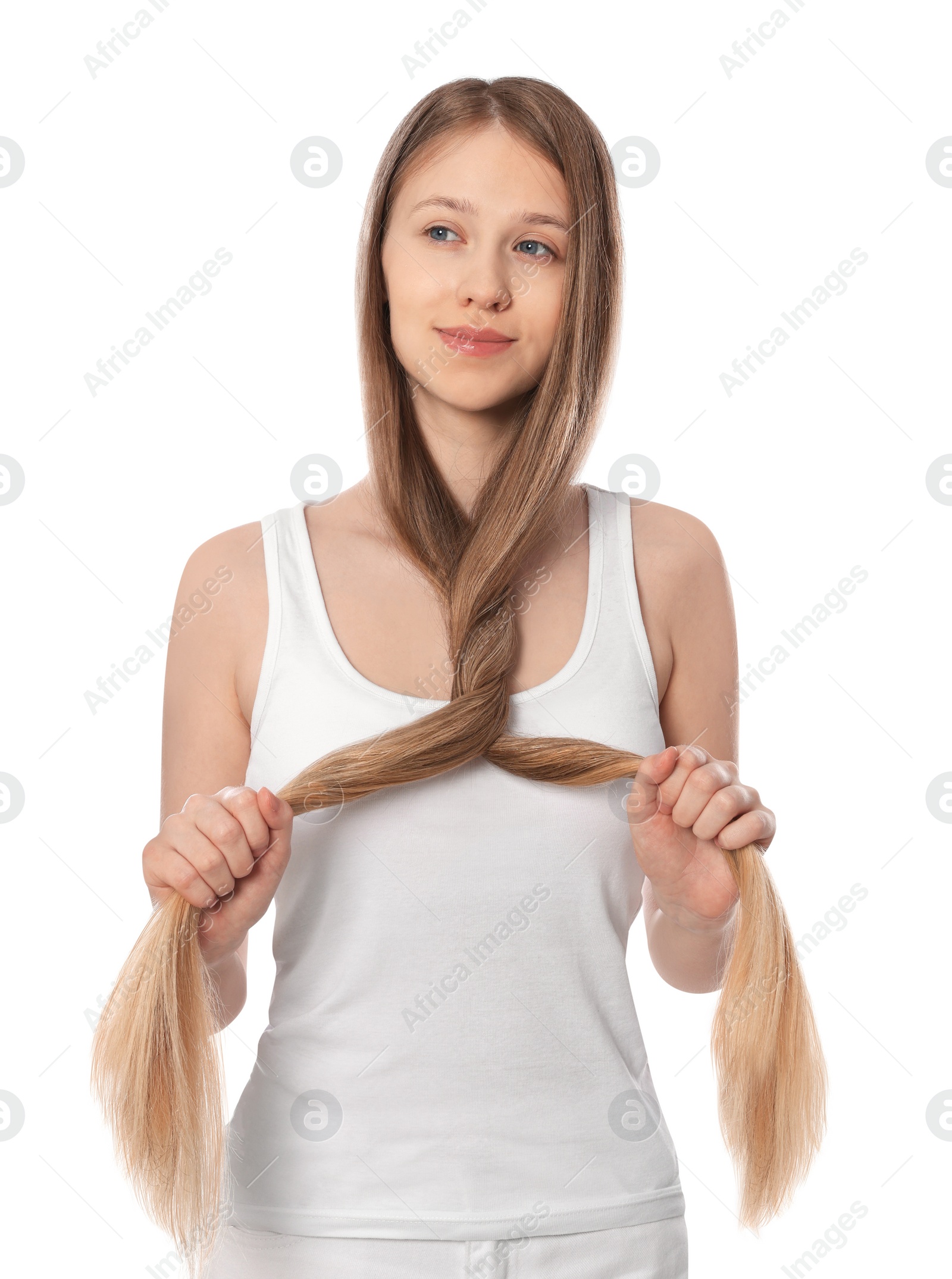 Photo of Teenage girl with strong healthy hair on white background