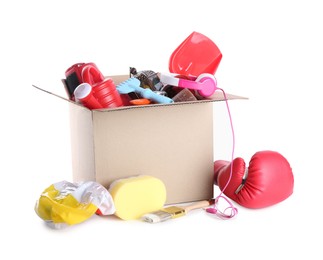 Photo of Box of unwanted stuff isolated on white