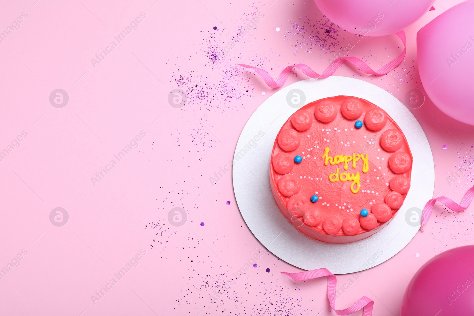 Photo of Cute bento cake with tasty cream and decor on pink background, flat lay. Space for text