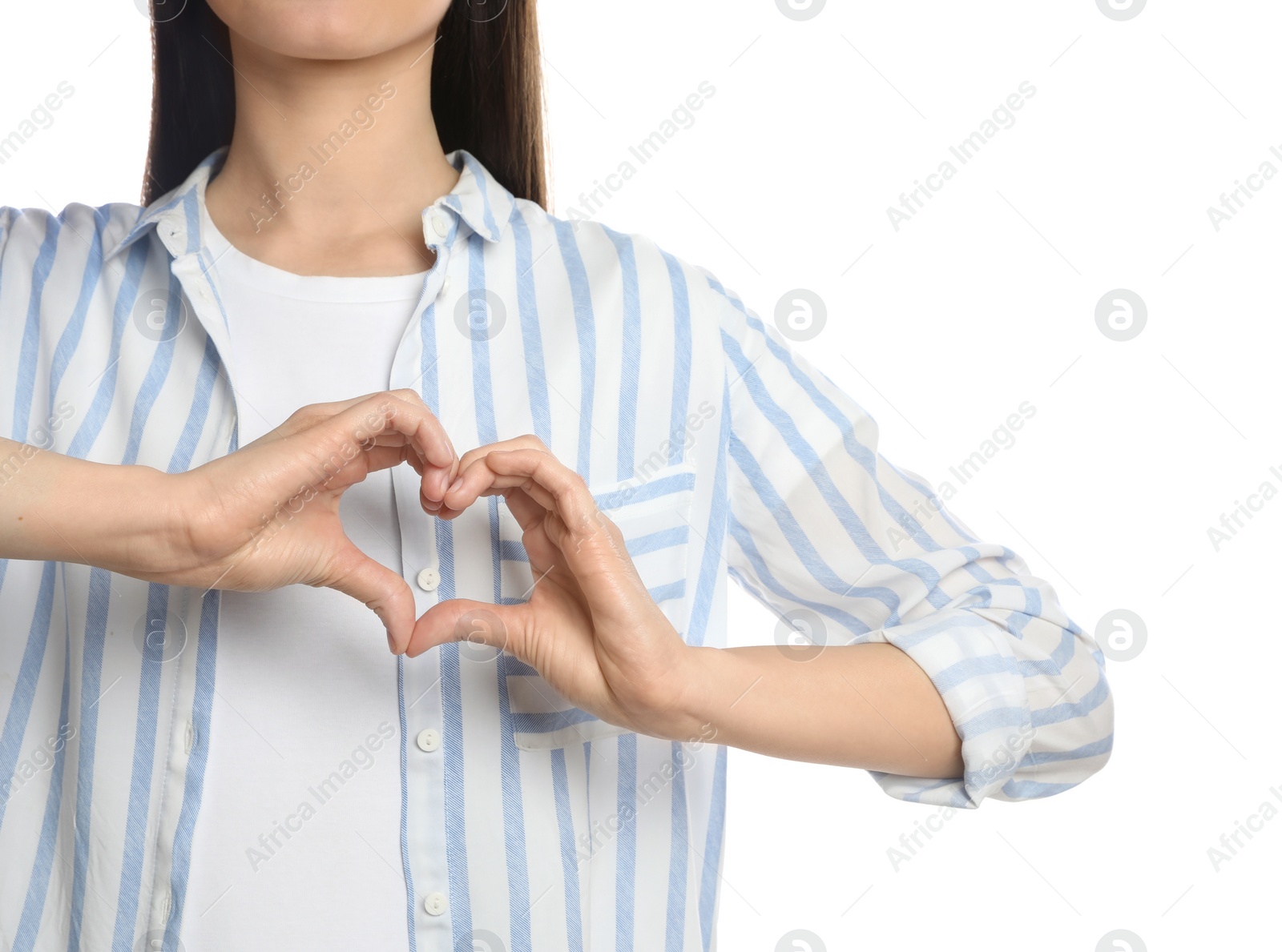 Photo of Woman showing heart on white background, closeup