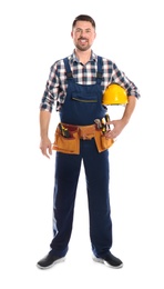 Photo of Full length portrait of professional construction worker with hard hat and tool belt on white background