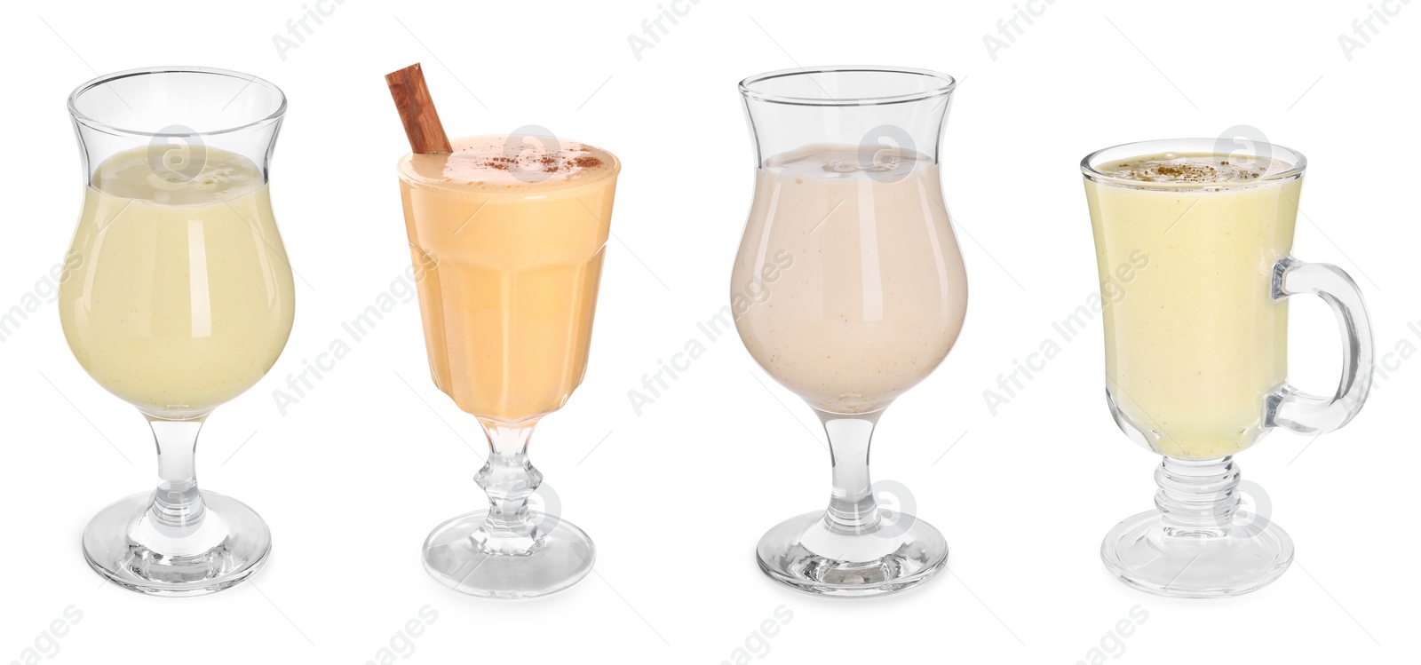 Image of Delicious eggnog in glasses isolated on white, set