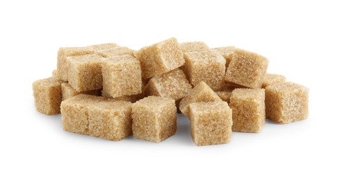 Photo of Many brown sugar cubes isolated on white