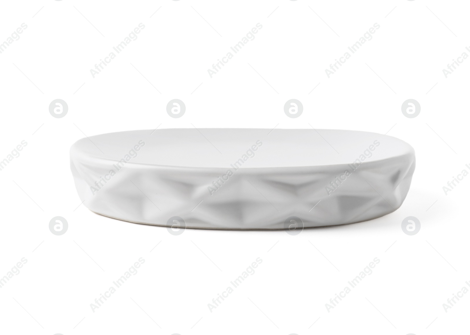 Photo of Bath accessory. Ceramic soap dish isolated on white