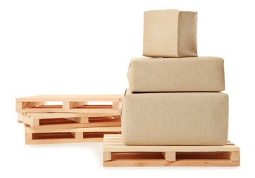 Small wooden pallets and boxes on white background
